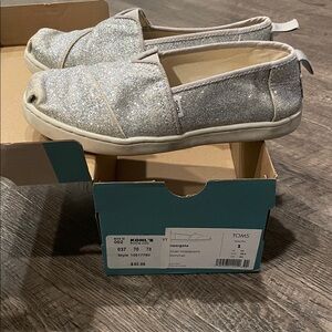 TOMS Shimmering Silver Slip-Ons
